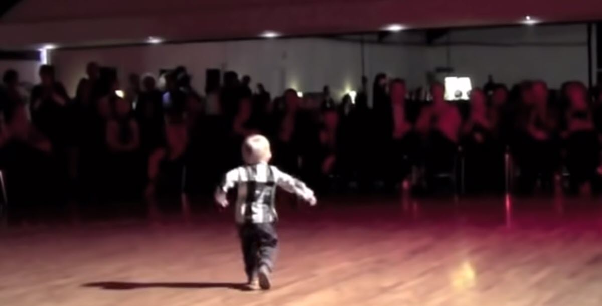 Entire Crowd Cracks up Laughing When Baby Starts Dancing to His Favorite Elvis Song